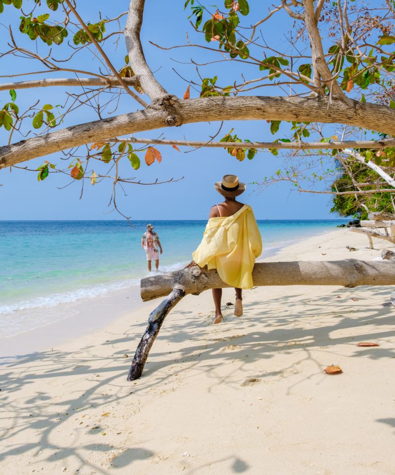 a-couple-of-men-and-woman-on-the-beach