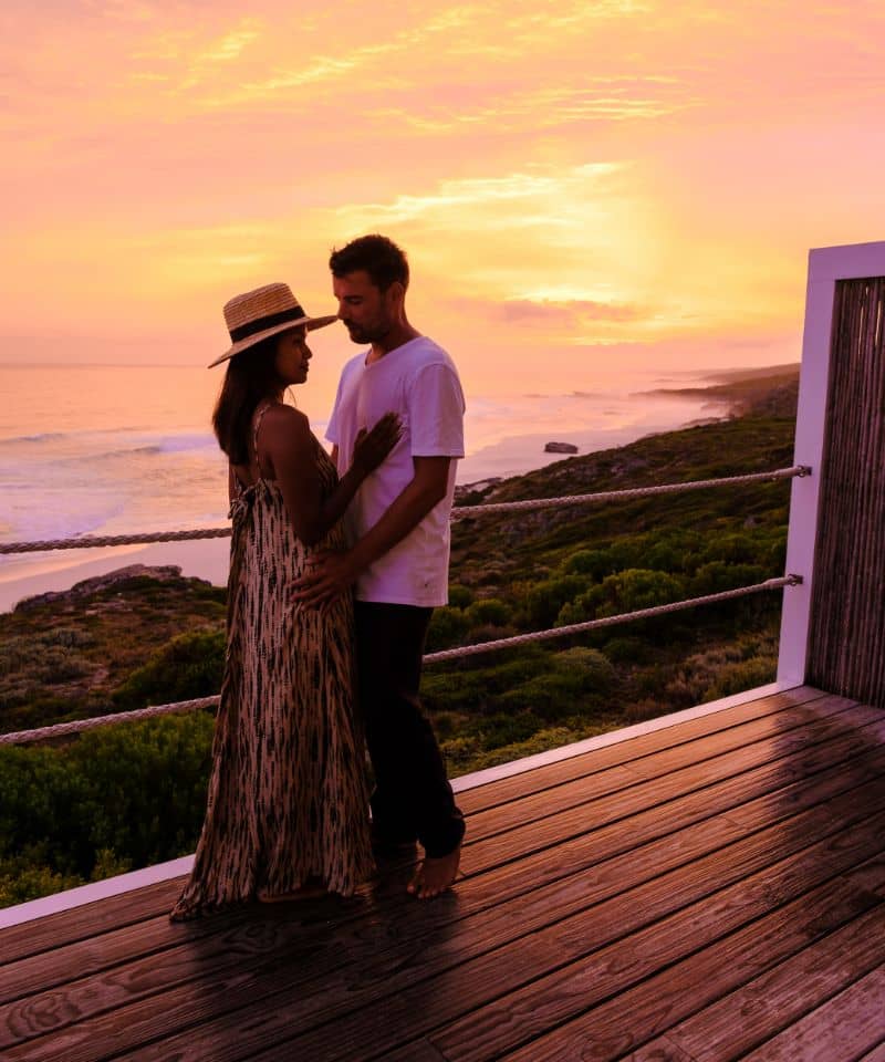 a-couple-of-men-and-women-watching-sunset