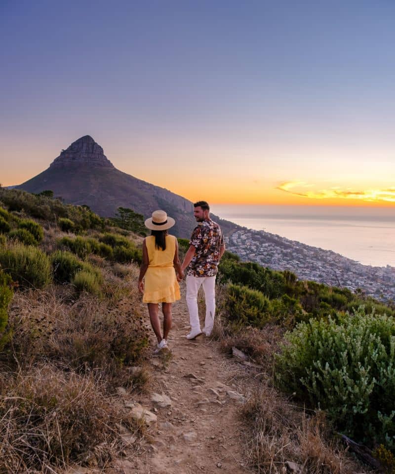 a-couple-of-men-and-women-watching-the-sunset
