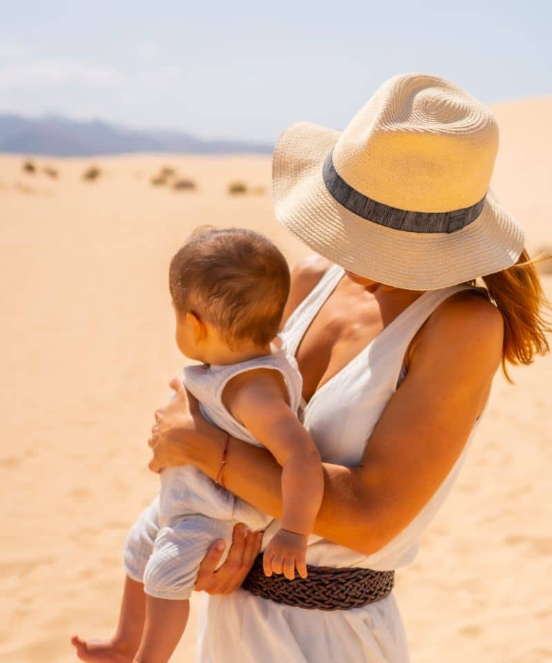 young-mother-with-her-son-in-the-dunes