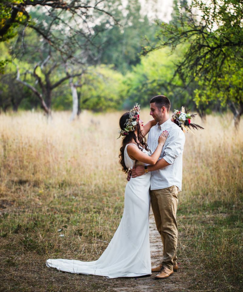 bride-and-groom-hugging-at-the-wedding-in-nature